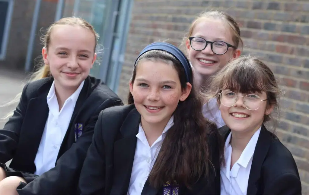 Smiling Girls at Breaktime Outside
